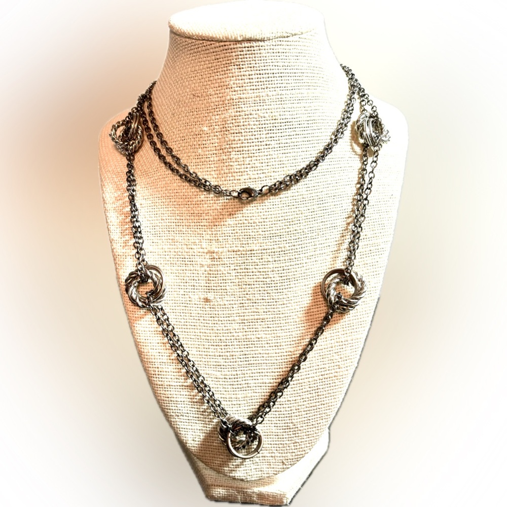Antiqued Long 34”Silvertone Chan with Knots of Three Interlocked Circles.